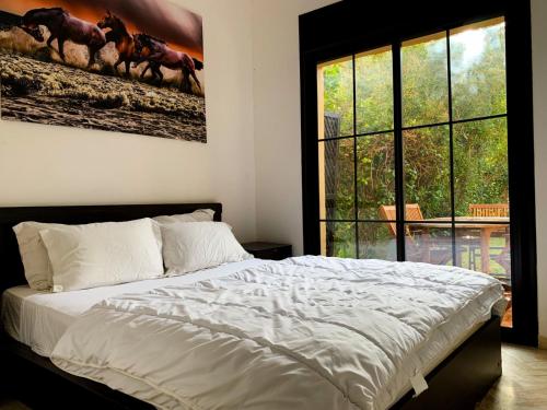 Postel nebo postele na pokoji v ubytování Residence atlas golf resort