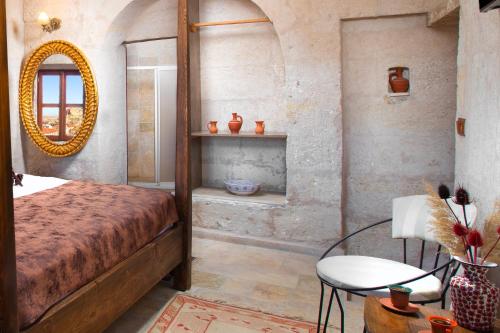 Postel nebo postele na pokoji v ubytování Romantic Cave Hotel