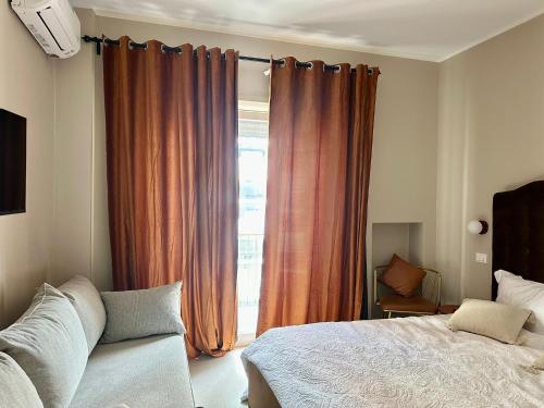Postel nebo postele na pokoji v ubytování Mandarin Apulia 19 B&B