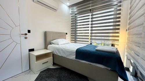 Postel nebo postele na pokoji v ubytování Serenity Villa