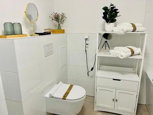 Ванная комната в FILMAP-Apartments-Zentrale Lage-Boxspringbett-Beamer-Popcorn-gratis Parkplatz