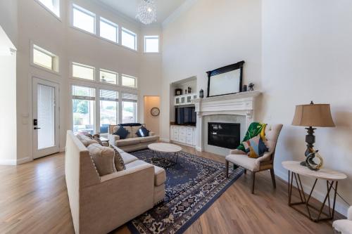 a living room with a couch and a fireplace at Family Home Near Lake & Local Parks in Little Elm
