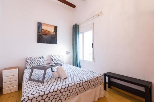 En eller flere senge i et værelse på Old Town Plaza Negrito by Nomad Host