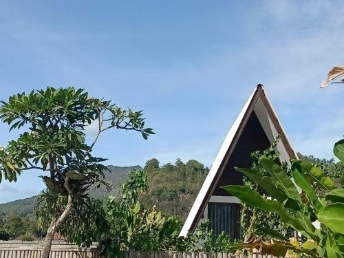 a chapel with a view of the mountains at Volcano White Glamping in Kubupenlokan