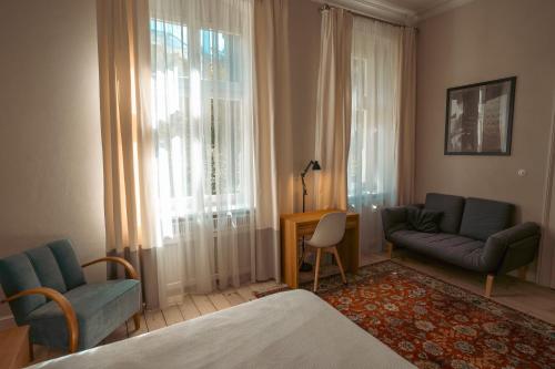 Ένα ή περισσότερα κρεβάτια σε δωμάτιο στο Villa Klara - Apartamenty Wakacyjne