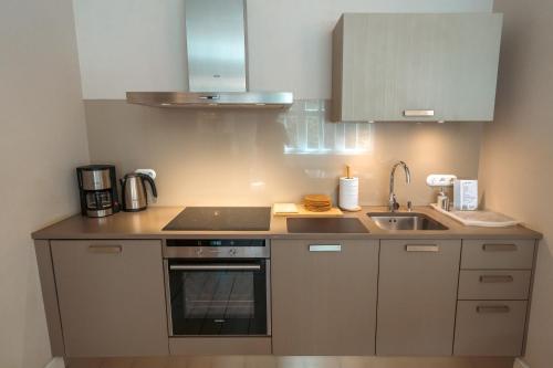 Η κουζίνα ή μικρή κουζίνα στο Villa Klara - Apartamenty Wakacyjne