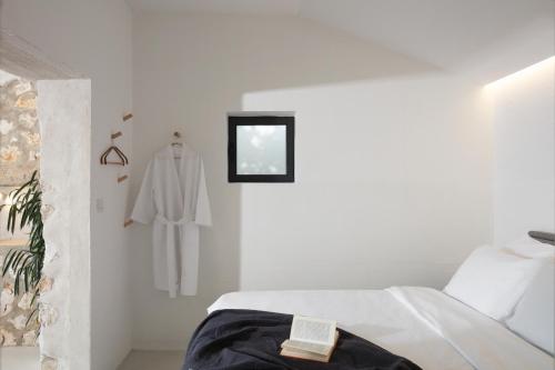 Postel nebo postele na pokoji v ubytování AB61 Tiny Design House for Two
