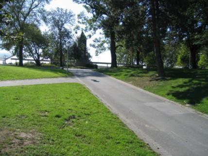 a road in a park with trees and grass at Gildenhof An den Westfalenhallen Dortmund in Dortmund