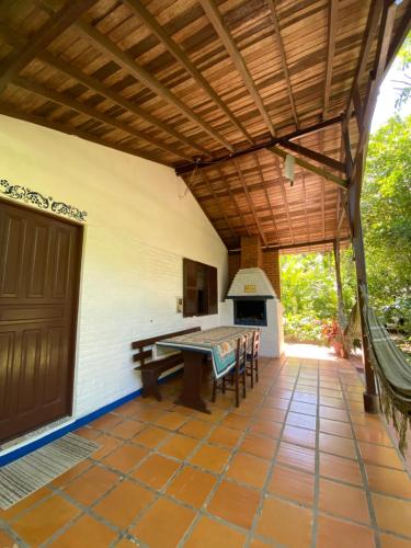 an outdoor patio with a ping pong table at Pousada do Pescador in Florianópolis