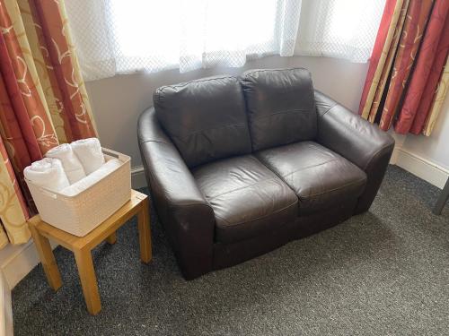 Χώρος καθιστικού στο Backpackers Blackpool Hotel & Suites