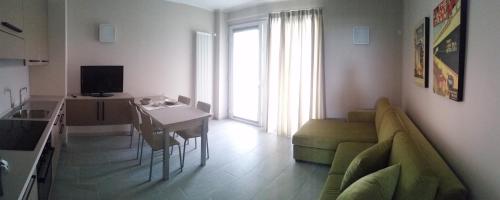 Μια τηλεόραση ή/και κέντρο ψυχαγωγίας στο Appartamenti Moonlight