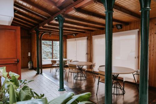 a group of tables and chairs in a room at Manfredi ristorante con alloggio in Romentino