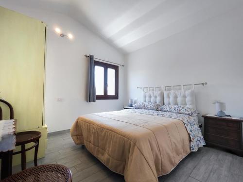 A bed or beds in a room at Domus Deiana