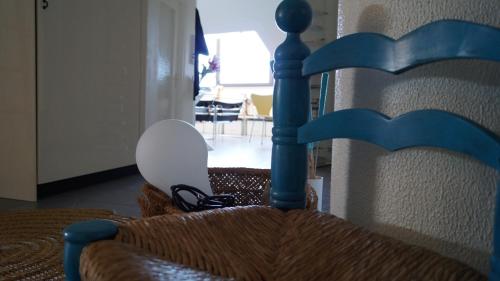 a close up of a bed with a blue head board at B&B Il Vicolo Di Pizzo in Pizzo