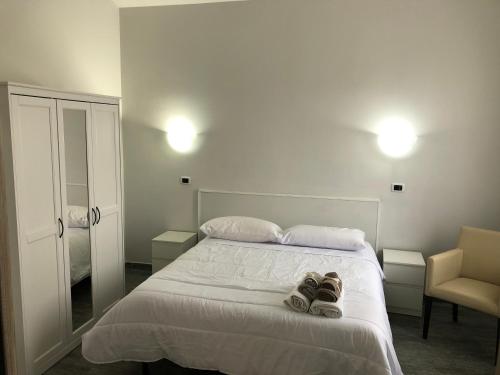 Postel nebo postele na pokoji v ubytování VILLA MORELLIS