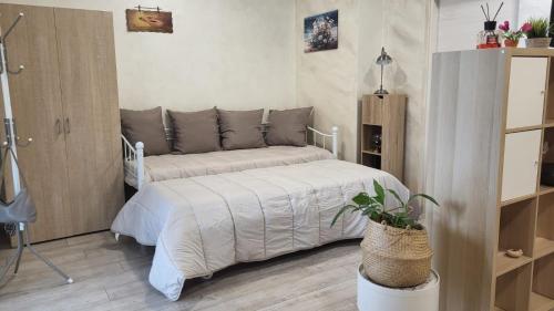 Ένα ή περισσότερα κρεβάτια σε δωμάτιο στο Sole&Scudo