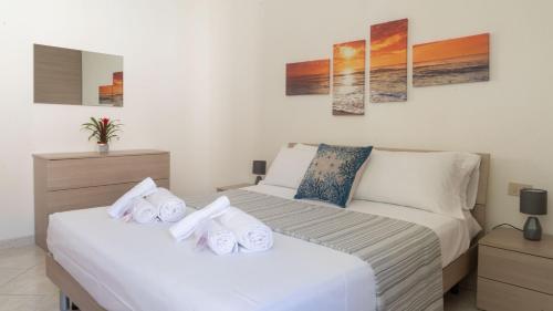 Ένα ή περισσότερα κρεβάτια σε δωμάτιο στο La Casa Dello Spritz