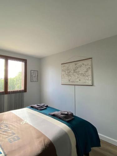 Ένα ή περισσότερα κρεβάτια σε δωμάτιο στο Appartement