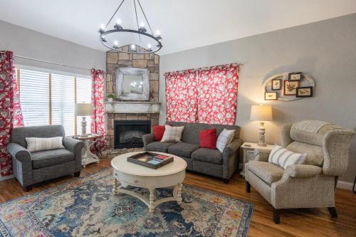 a living room with two couches and a fireplace at 3BR with Loft - Near The Strip - FREE TICKETS INCLUDED - FW2-6 in Branson