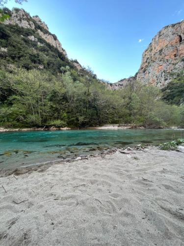 a view of the river from the beach at DownTown Apartment Konitsa in Konitsa