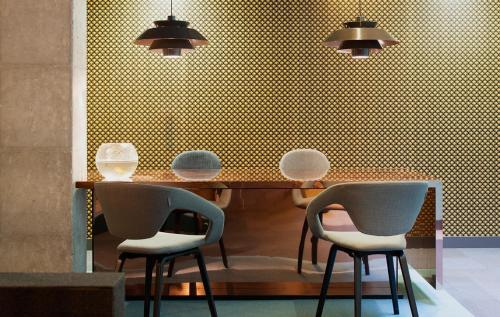 Ruang duduk di Apartamentos NONO by Charming Stay