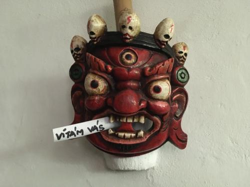 a red mask with a sign that says warn me at Holubník statečných žen králových in Luže