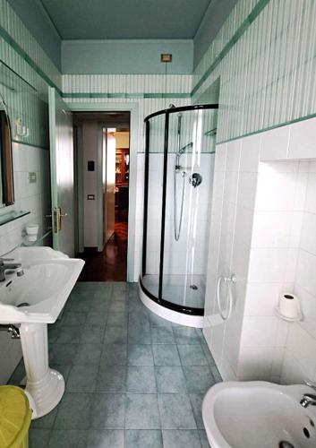 a bathroom with a shower and a sink at La Dimora del Centro in Iesi