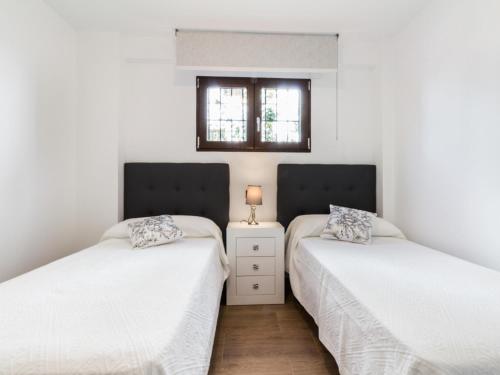 Ένα ή περισσότερα κρεβάτια σε δωμάτιο στο Casa huerta maria