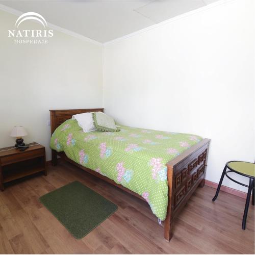 Una cama o camas en una habitación de Natiris