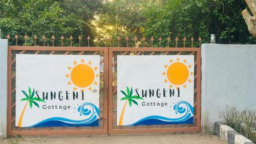 a gate with a sign for the summer cafe at Sungeni Cottage @ Lake Malawi in Mponda