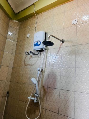 Vonios kambarys apgyvendinimo įstaigoje Botique Inn