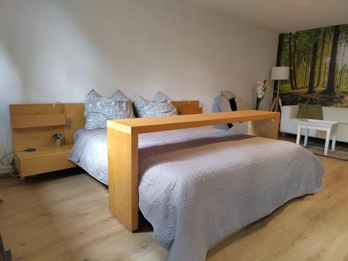 Ένα ή περισσότερα κρεβάτια σε δωμάτιο στο Ferienwohnung Hohes Venn