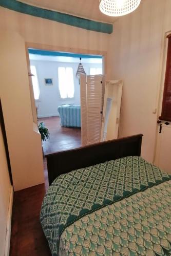 Ένα ή περισσότερα κρεβάτια σε δωμάτιο στο Le grand Houx