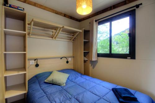 Postel nebo postele na pokoji v ubytování CHALET U Castagnu