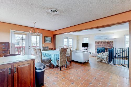 a kitchen and dining room with a table and chairs at Fenwick Island --- 20 W Maryland Avenue in Fenwick Island