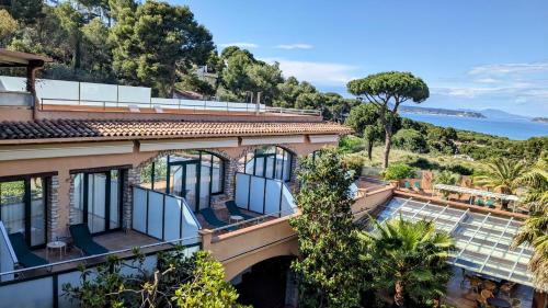 an aerial view of a building with a view of the ocean at Hotel Sa Punta - Adults Only fr13 in Begur