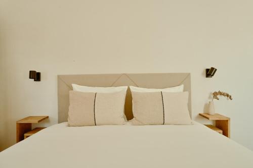 Een bed of bedden in een kamer bij Casa Uva - Boutique Guest House