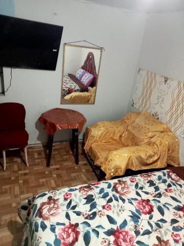 Postel nebo postele na pokoji v ubytování Posada Ternura