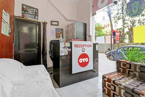 a hospital room with a bed and aederationphrine sign at OYO Hotel Lion in New Delhi