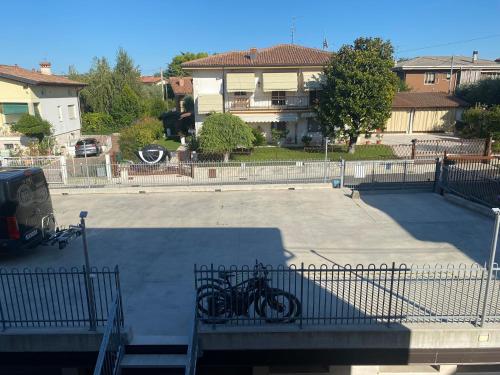 a parking lot with a bunch of bikes parked in it at Albergo AQUILA in Lazise