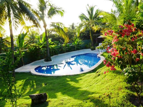 Kolam renang di atau dekat dengan SPA da FLORESTA I Pipa-Sibaúma I 5min da Praia