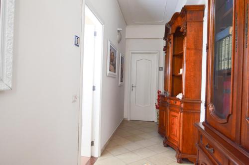 a room with a hallway with a cabinet and a door at Casa Ekaterina free wifii - spiaggia 200 metri in Brolo
