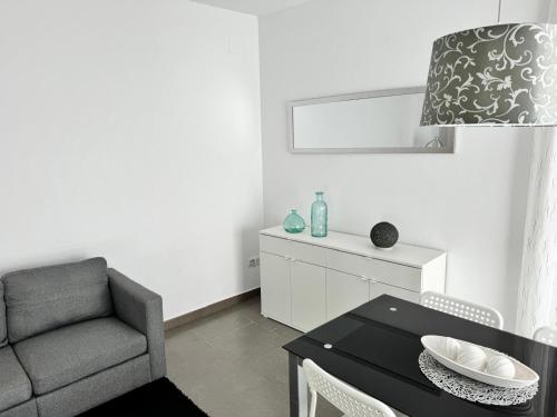 Posezení v ubytování APARTAMENTO ROMELIA 1ºa