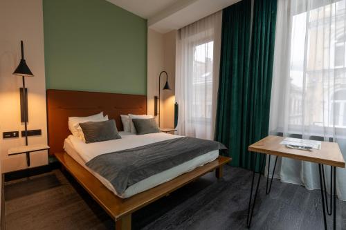 Postel nebo postele na pokoji v ubytování Hotel Astra