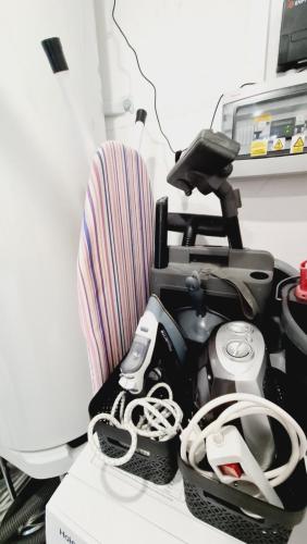 a sewing machine sitting on top of a desk at Le Loft de Village-Neuf - Résidence 4 étoiles in Village-Neuf