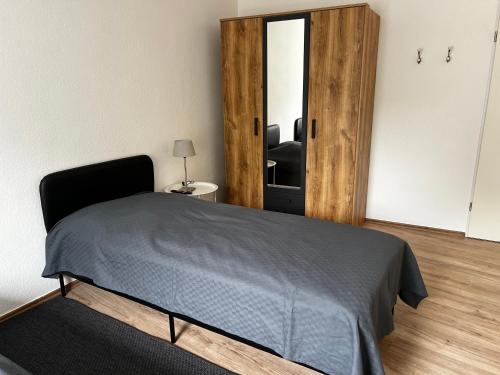 Postel nebo postele na pokoji v ubytování Apartment zum Wohlfühlen am Rande der Eifel