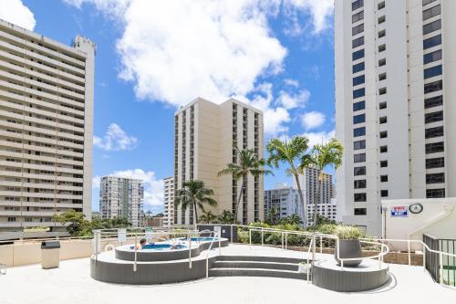 a view of a city skyline with tall buildings at Waikiki Beach Ocean View King Bed & Free Parking in Honolulu