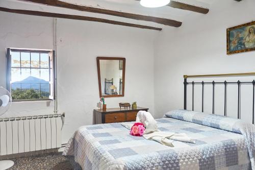 Ένα ή περισσότερα κρεβάτια σε δωμάτιο στο La Sierrezuela