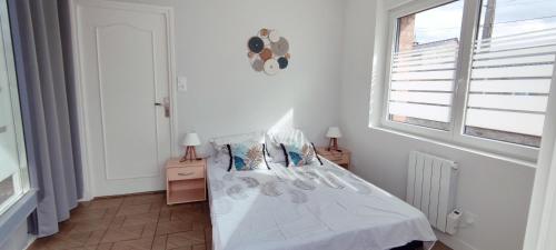 Postel nebo postele na pokoji v ubytování Maison individuelle plein pied