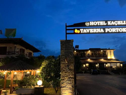 a sign for the hotel kabasekka fortress at night at Hotel Kaceli in Berat